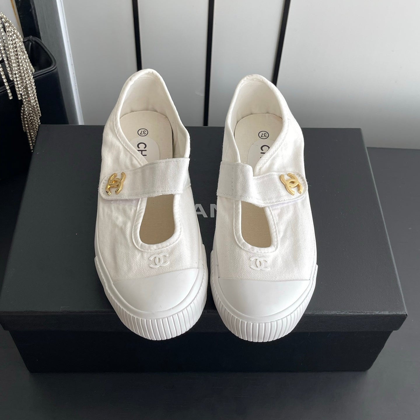 CHANEL 26S MARY JANE SNEAKERS IN WHITE CANVAS WITH GOLD-TONE METAL CC LOGO