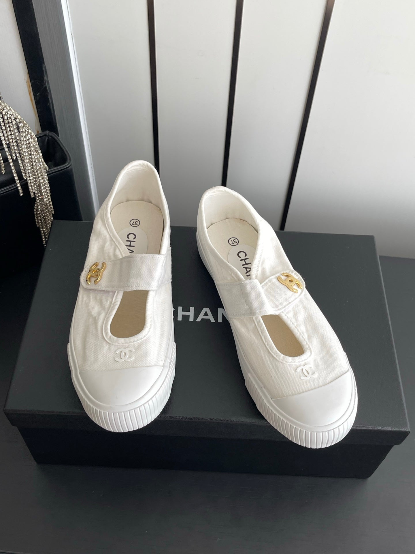 CHANEL 26S MARY JANE SNEAKERS IN WHITE CANVAS WITH GOLD-TONE METAL CC LOGO