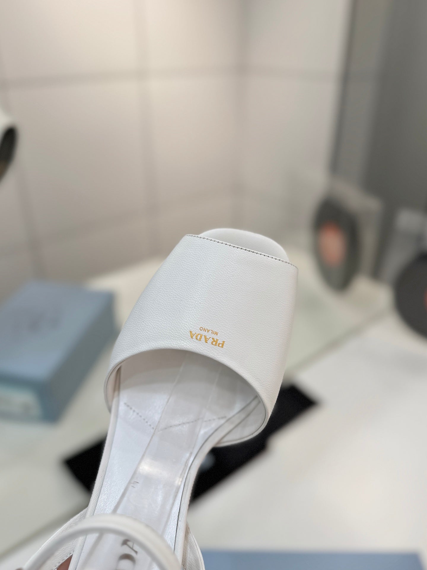 PRADA 26S HEELED SANDALS 115MM IN WHITE CALFSKIN