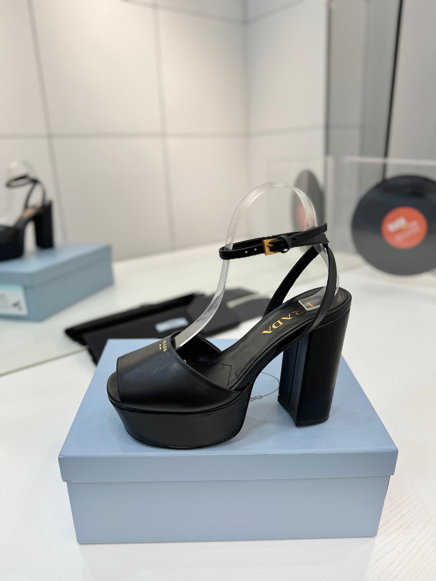 PRADA 26S HEELED SANDALS 115MM IN BLACK CALFSKIN