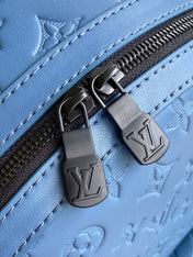 DISCOVERY BACKPACK 38 IN BLUE MONOGRAM ECLIPSE CANVAS AND TAURILLON