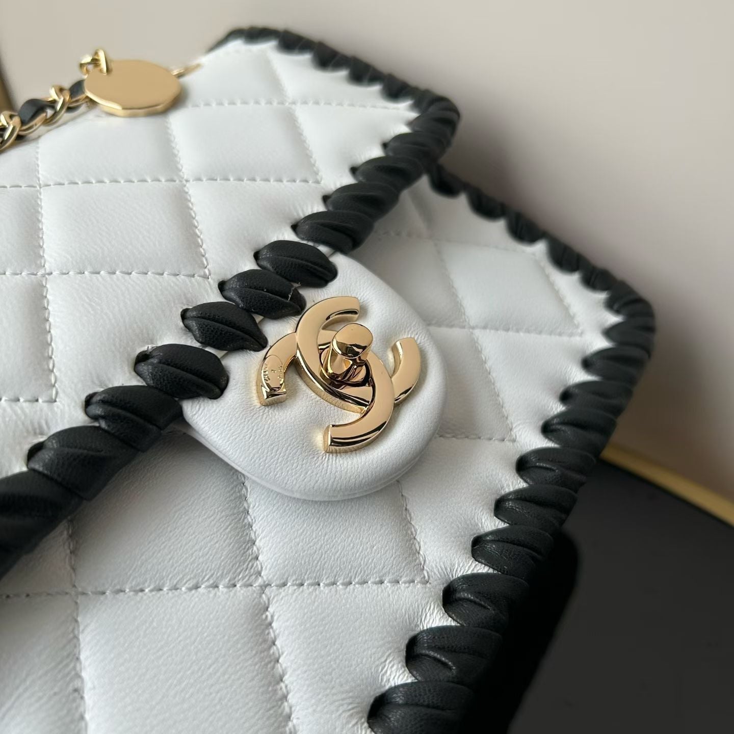 CHANEL 26S FLAP BAG 19 IN WHITE QUILTED LAMBSKIN WITH BLACK LEATHER TRIM