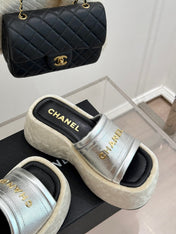 PLATFORM SLIPPERS IN SILVER LAMBSKIN