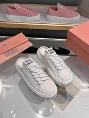 MIUMIU 26S SNEAKER MULES 45MM IN WHITE MESH