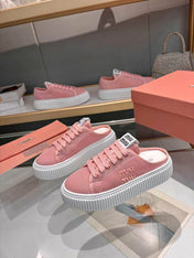 MIUMIU 26S SNEAKER MULES 45MM IN PINK MESH
