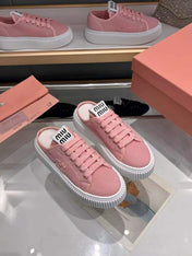 MIUMIU 26S SNEAKER MULES 45MM IN PINK MESH