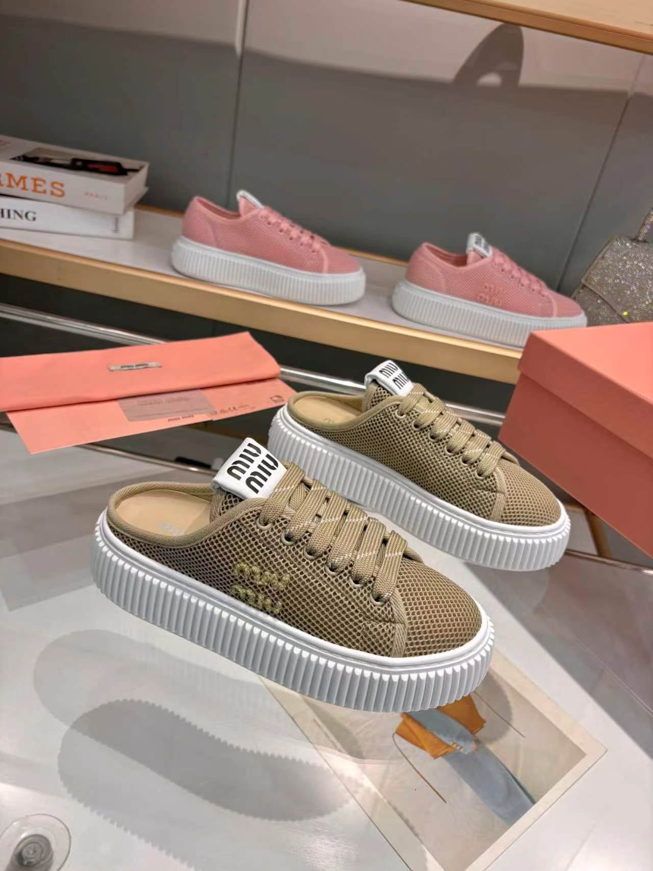 MIUMIU 26S SNEAKER MULES 45MM IN OLIVE GREEN MESH