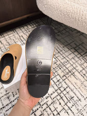 FLAT MULE IN SEPIA BEIGE CALFSKIN