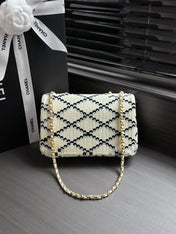 CHANEL 26S CLASSIC FLAP BAG 21 IN CREAM WHITE WITH BLACK TRIM SEQUINS