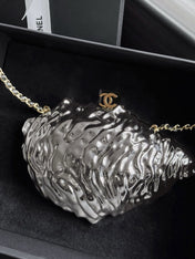 CHANEL 26S OYSTER MINAUDIERE BAG IN METALLIC SILVER PLATED METAL