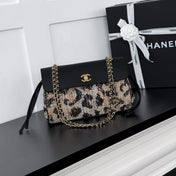 CHANEL 26S SHOULDER BAG 29 IN BLACK CALFSKIN WITH LEOPARD-PRINT TWEED