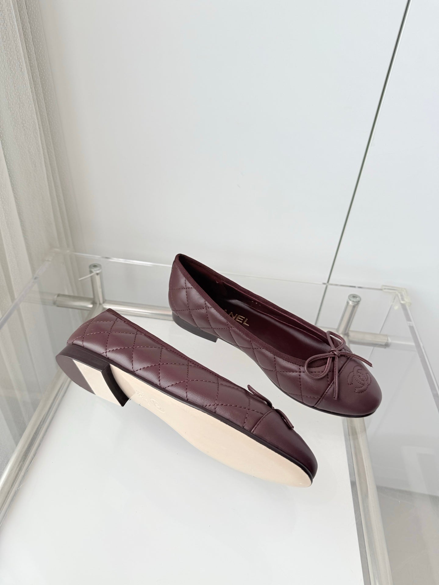 CHANEL 26S BALLET FLATS IN BURGUNDY RED QUILTED CALFSKIN WITH BOW
