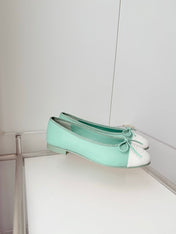CHANEL 26S BALLET FLATS IN MINT GREEN CALFSKIN WITH WHITE TOE CAP AND BOW