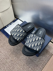DIOR 25S ALIAS SLIDES IN BLACK CALFSKIN WITH CD OBLIQUE DEEP BLUE LOGO