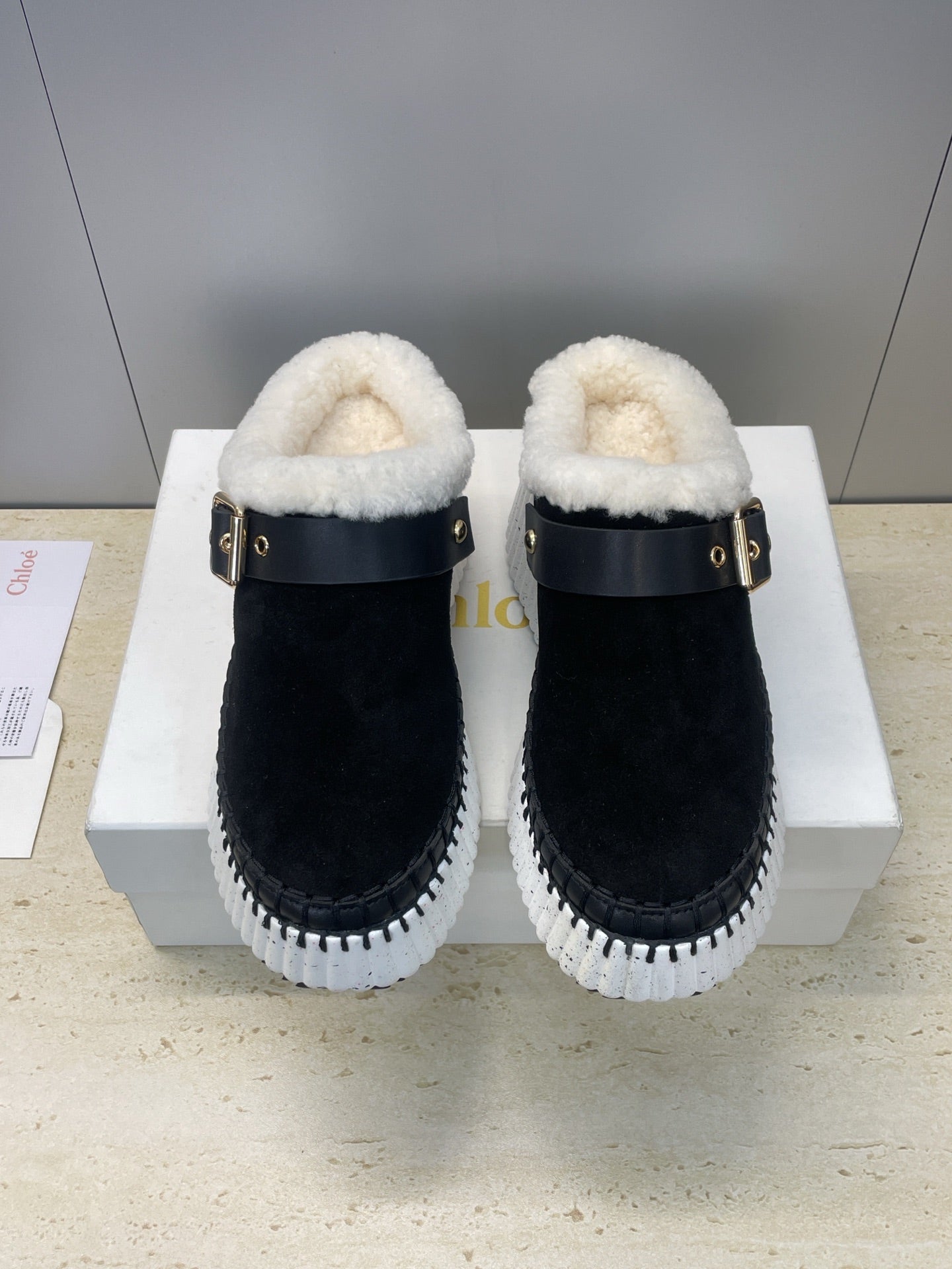CHLOÉ 26S FUR-LINED WEDGE MULES IN BLACK SUEDE