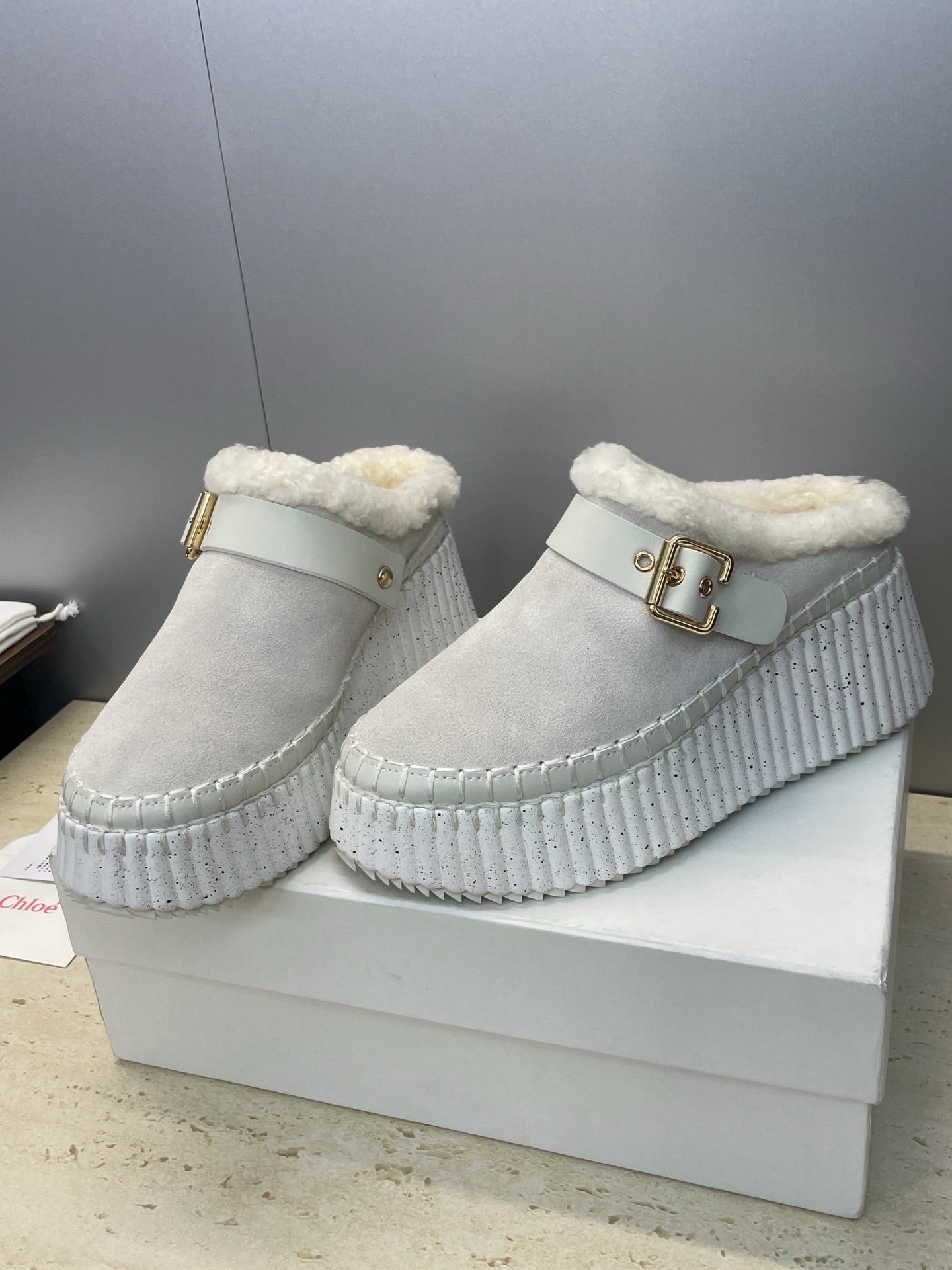 CHLOÉ 26S FUR-LINED WEDGE MULES IN LIGHT GREY SUEDE
