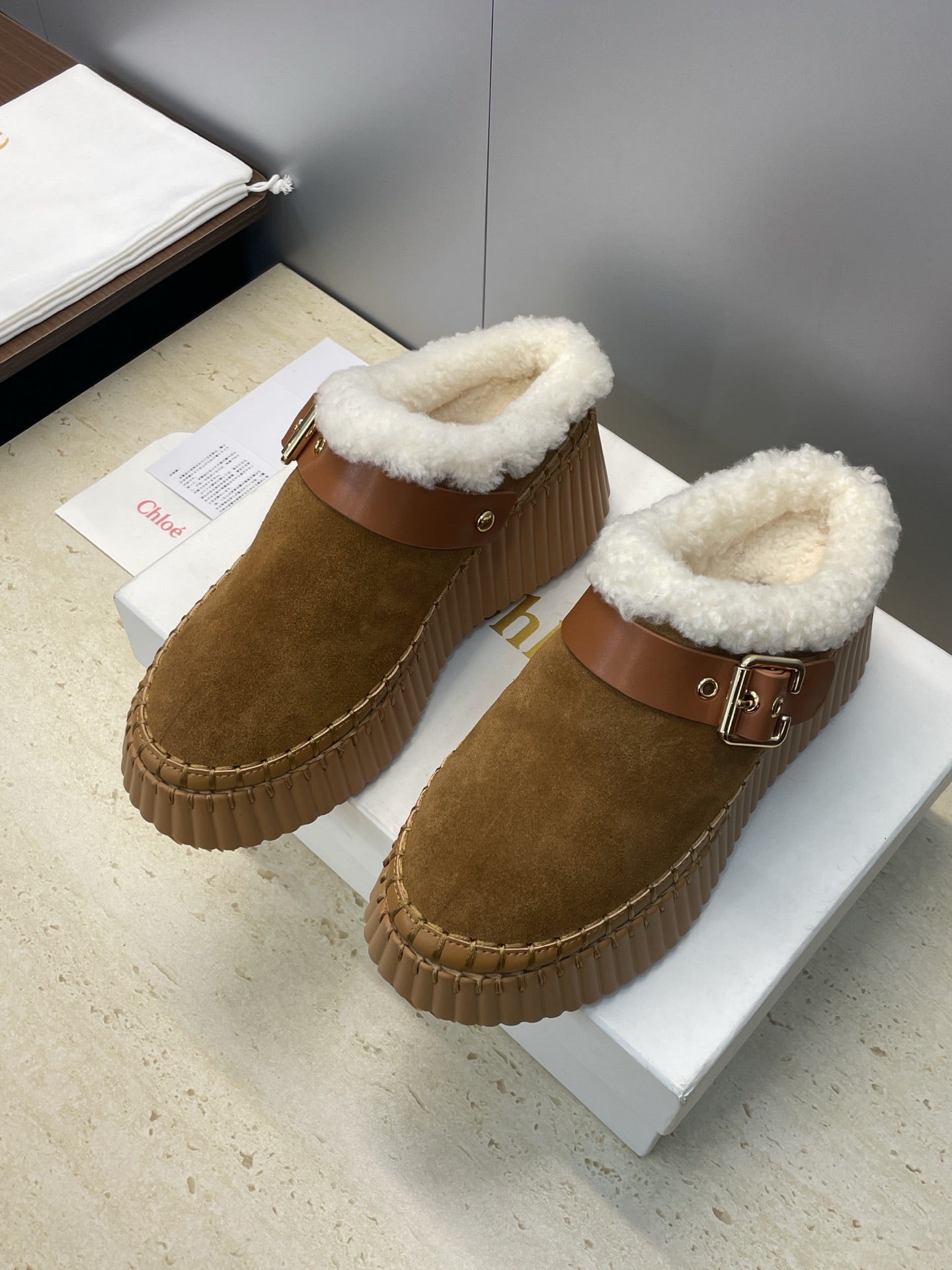 CHLOÉ 26S FUR-LINED WEDGE MULES IN BROWN SUEDE