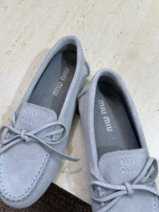MIUMIU 26S LOAFERS IN LIGHT BLUE SUEDE WITH BOW