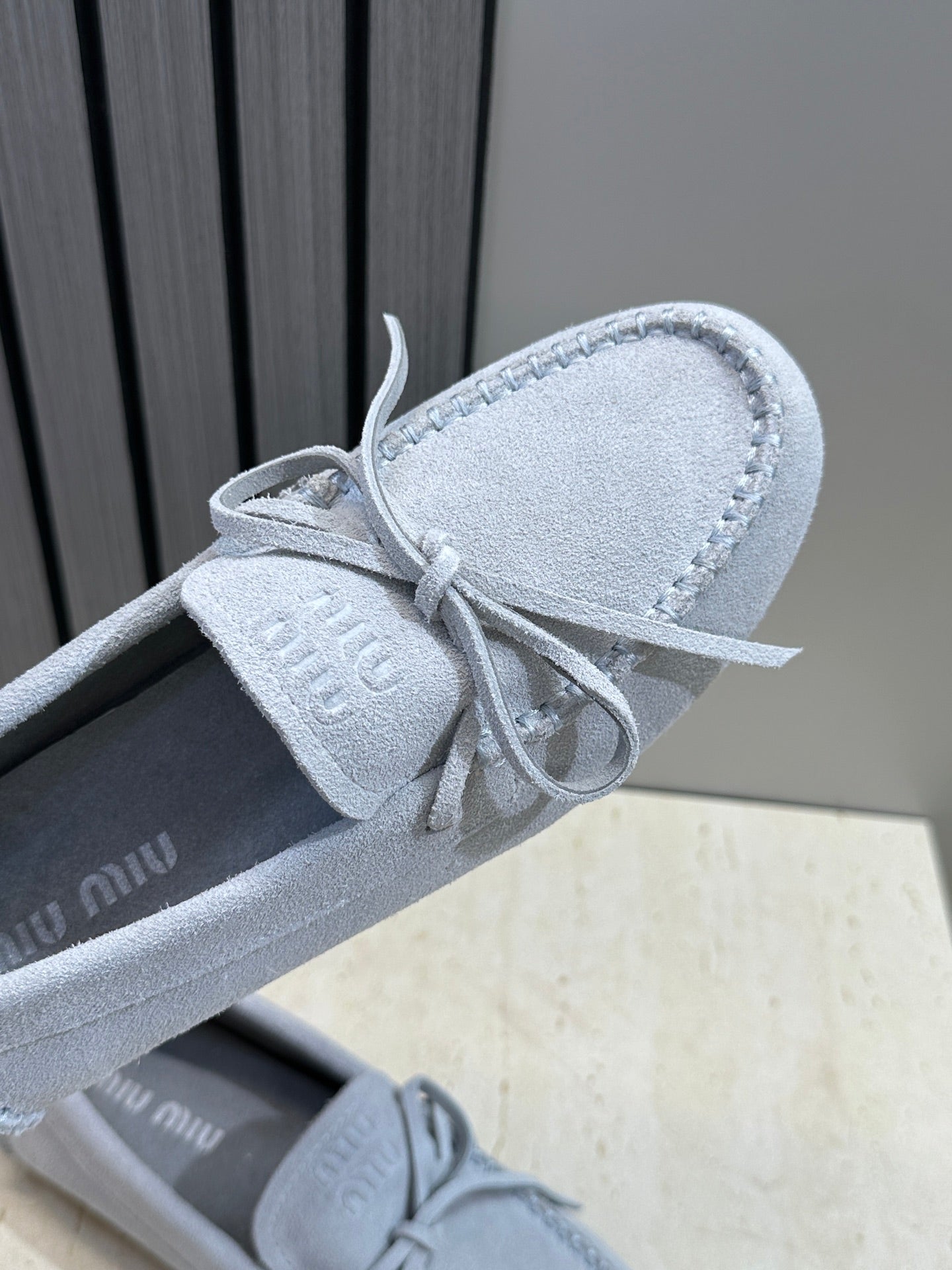 MIUMIU 26S LOAFERS IN LIGHT BLUE SUEDE WITH BOW