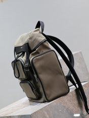 CITY MULTI-POCKET BACKPACK 42 IN KHAKI GREEN NYLON AND BLACK SMOOTH CALFSKIN