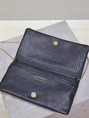 CALYPSO POUCH 24 IN BLACK ELEPHANT TEXTURED LAMBSKIN GOLD LOGO