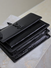 YSL 25S SUNSET MEDIUM 22 IN BLACK CROCODILE-EMBOSSED SHINY CALFSKIN BLACK HARDWARE