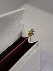 CASSANDRA CHAIN BAG 22 IN WHITE CROCODILE PATTERN CALFSKIN GOLD HARDWARE