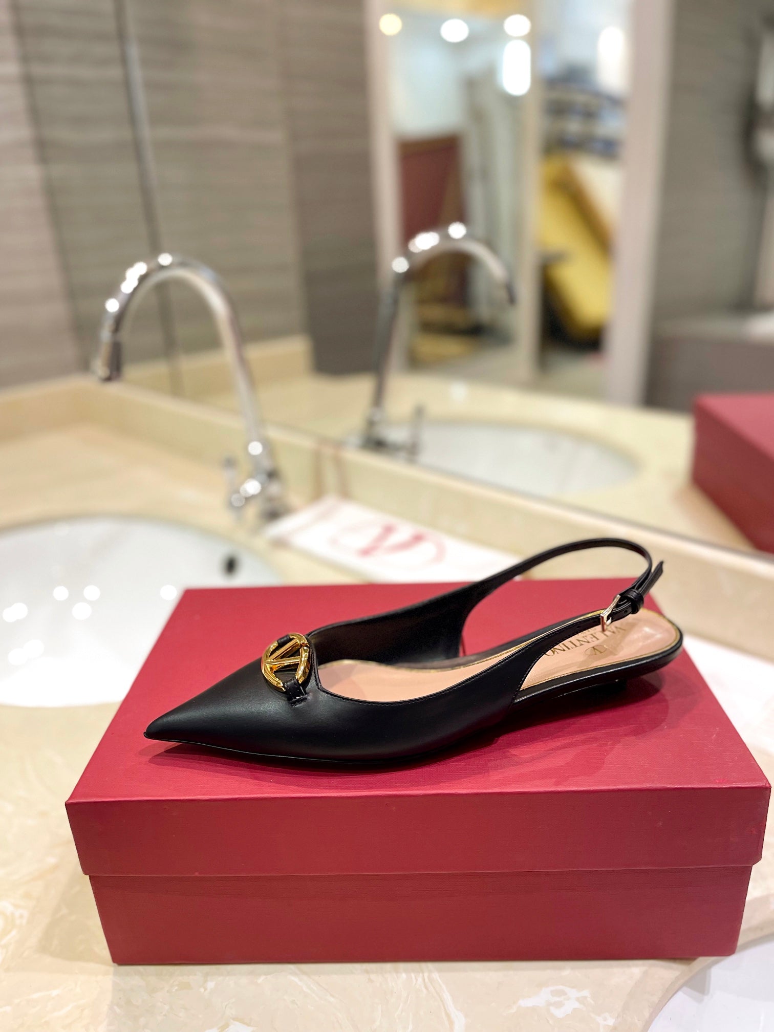VALENTINO 26S POINTED TOE FLAT SLINGBACKS IN BLACK CALFSKIN