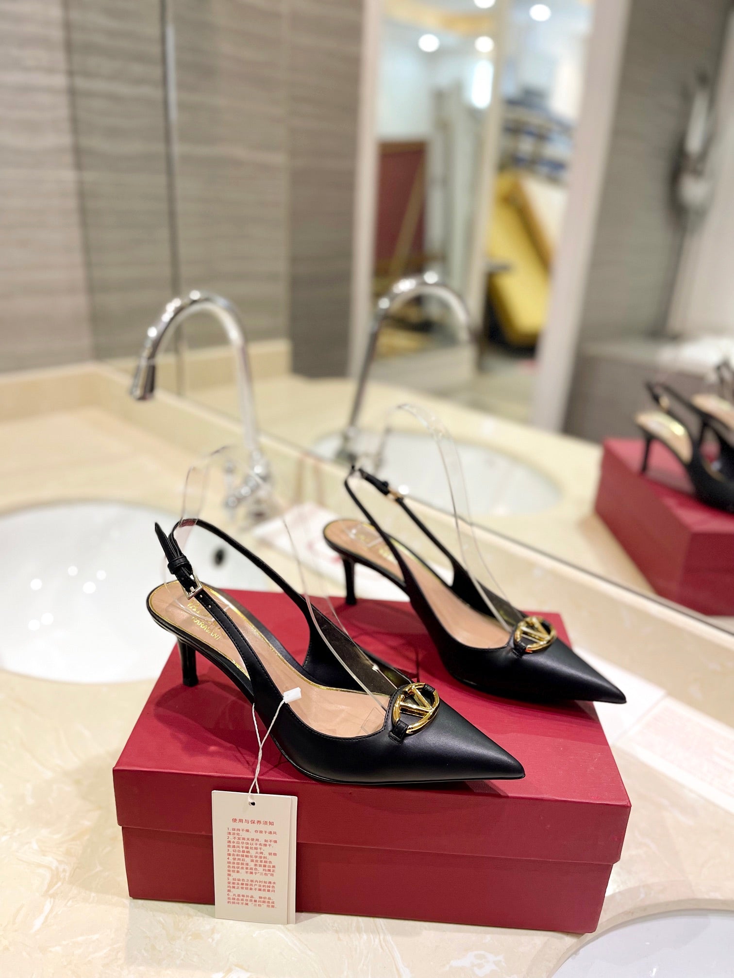 VALENTINO 26S SLINGBACK PUMPS 65 MM IN BLACK CALFSKIN