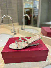 ROCKSTUD MULE SANDALS IN WHITE CALFSKIN AND TRANSPARENT PVC FILM