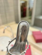 ROCKSTUD MULE SANDALS IN SILVER CALFSKIN AND TRANSPARENT PVC FILM