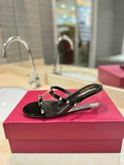 ROCKSTUD MULE SANDALS IN BLACK CALFSKIN AND TRANSPARENT PVC FILM