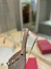 ROCKSTUD MULE SANDALS WITH TRANSPARENT HEEL IN CREPE PINK CALFSKIN