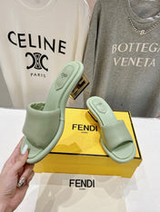FENDI BAGUETTE MEDIUM-HEEL SANDALS 45 MM IN GREEN MINT CALFSKIN