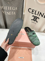 KNITTED MULES IN LIGHT GREEN MIX BLACK WOOL