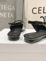 JUDY FLAT SLINGBACK IN BLACK PATENT CALFSKIN