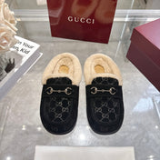 GUCCI 26S MULES IN BLACK SUEDE GG LOGO PATTERN