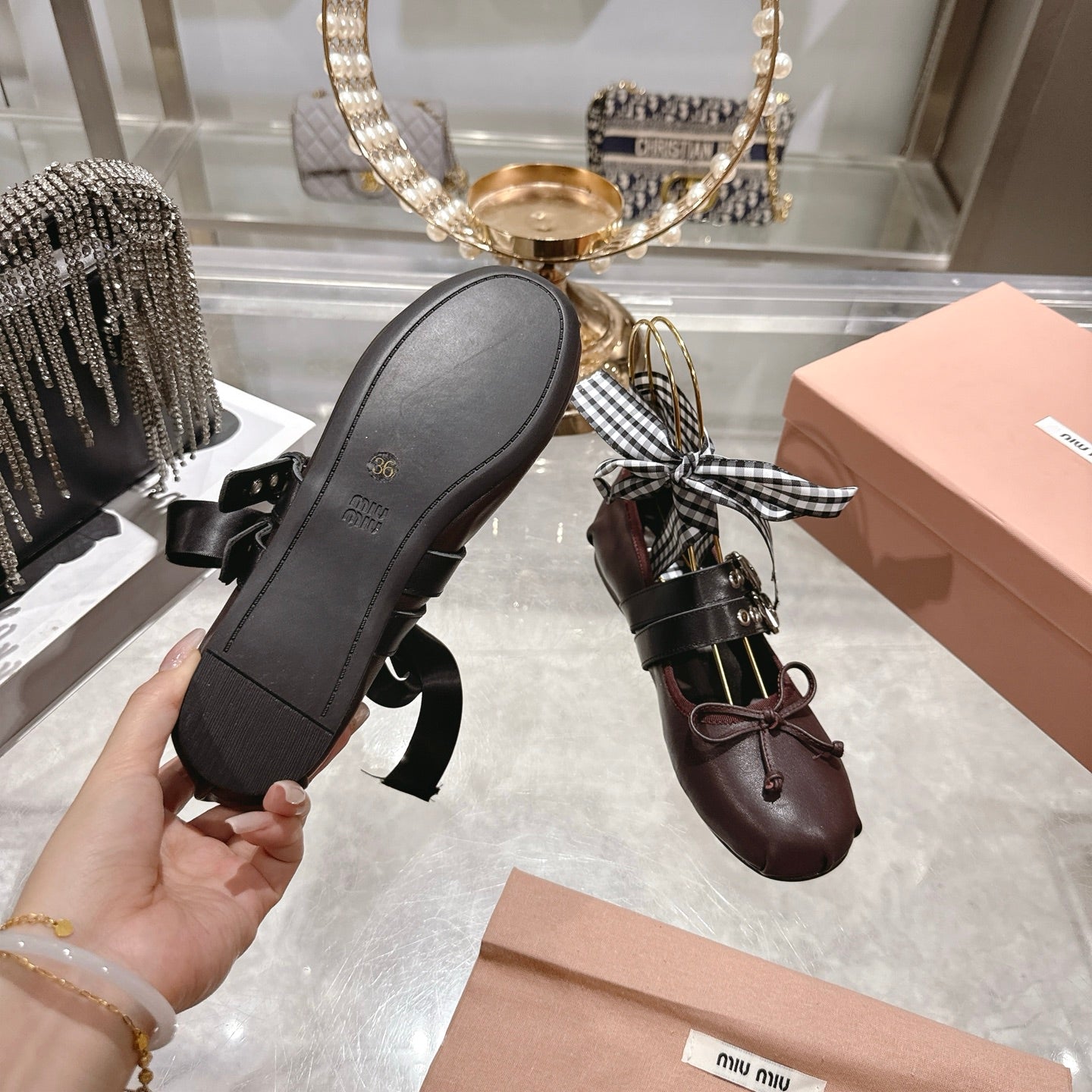 MIUMIU 26S SLINGBACK BALLET FLATS IN DARK BROWN CALFSKIN AND BLACK STRAP RIBBON