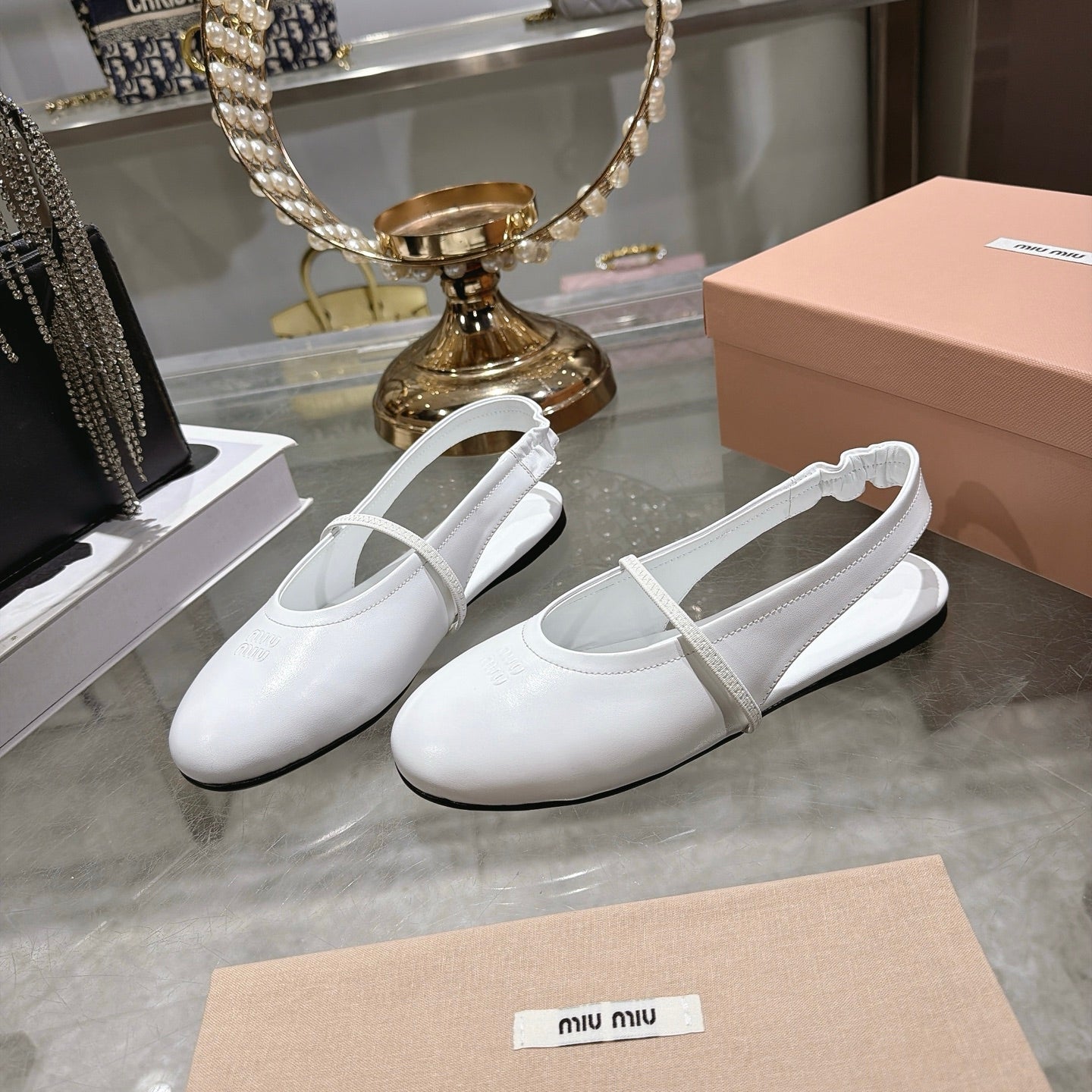 MIUMIU 26S MARY JANE FLATS IN WHITE CALFSKIN