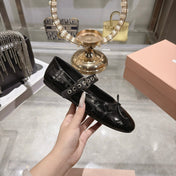 MIUMIU 26S MARY JANE FLATS IN BLACK CROC-EMBOSSED LEATHER