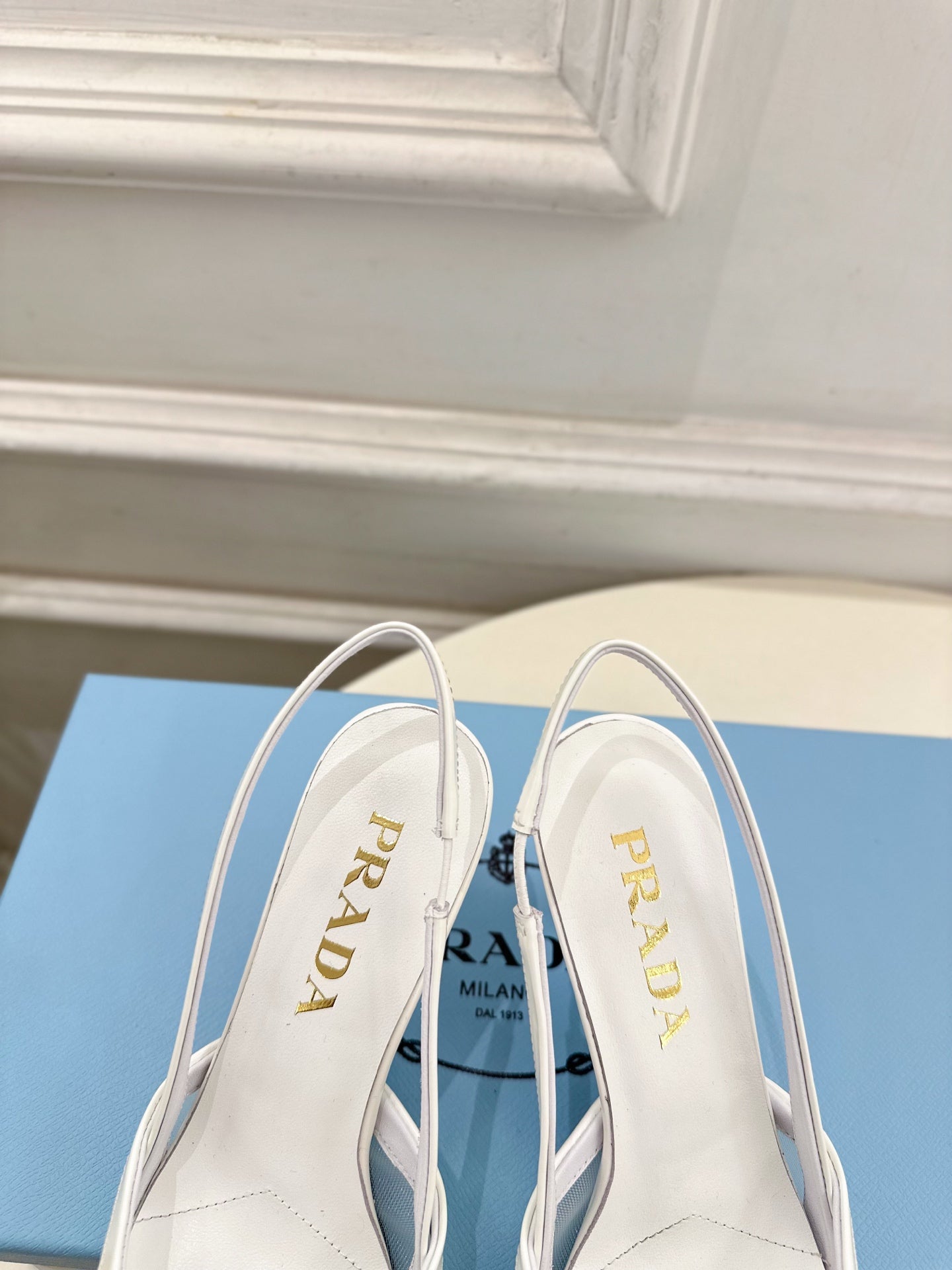 PRADA 26S POINTED-TOE SLINGBACK HEELS 75MM IN WHITE MESH WITH BLACK BOW