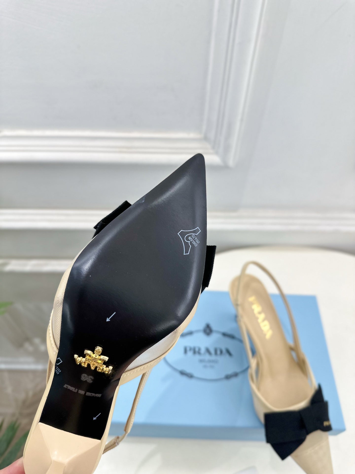PRADA 26S POINTED-TOE SLINGBACK HEELS 75MM IN BEIGE MESH WITH BLACK BOW