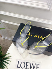 ALAIA 26S POINTED-TOE THONG SANDALS IN LIGHT YELLOW SATIN AND TRANSPARENT PVC
