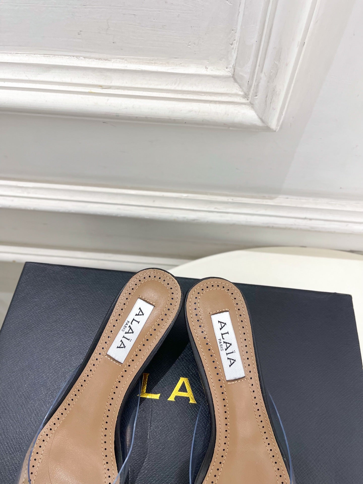 ALAIA 26S MULE HEELS 55 MM IN BLACK LAMBSKIN AND TRANSPARENT PVC