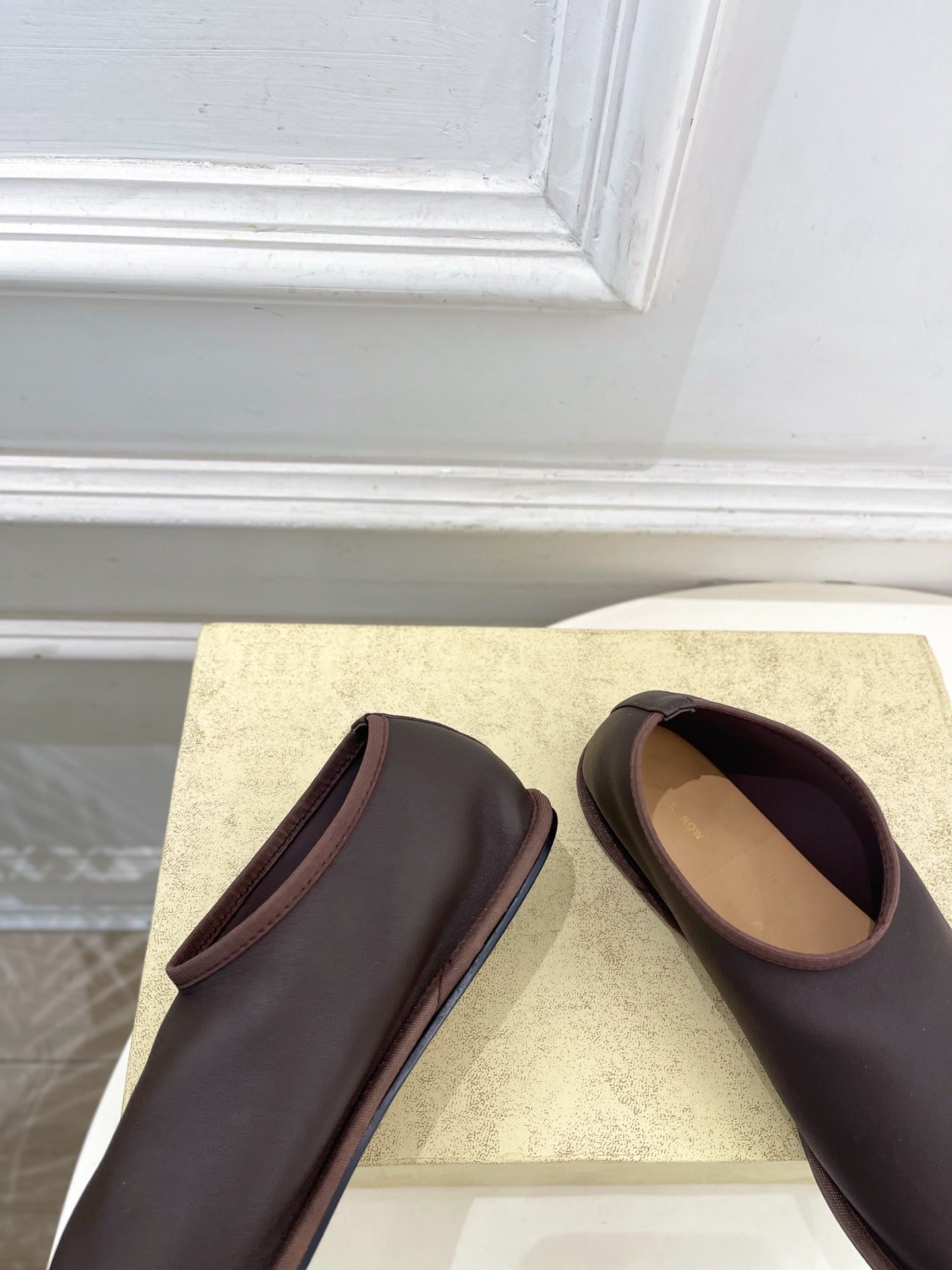 THE ROW 26S SLIP-ON FLATS IN DARK BROWN NAPPA CALFSKIN