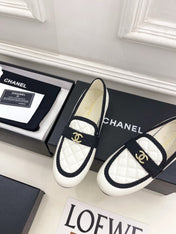 CHANEL 26S LOAFER MULES IN WHITE LAMBSKIN AND BLACK FABRIC