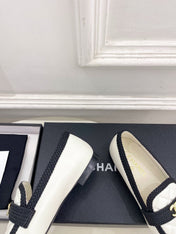 CHANEL 26S LOAFER MULES IN WHITE LAMBSKIN AND BLACK FABRIC