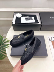 CHANEL 26S LOAFER MULES IN BLACK LAMBSKIN AND TWEED