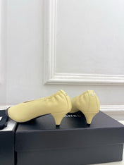 CHANEL 26S SQUARE TOE PUMPS 50 MM IN LIGHT YELLOW LAMBSKIN WITH BLACK TOE CAP